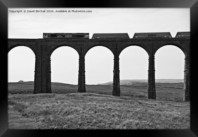 Freight train on Ribblehead viaduct. Framed Print by David Birchall