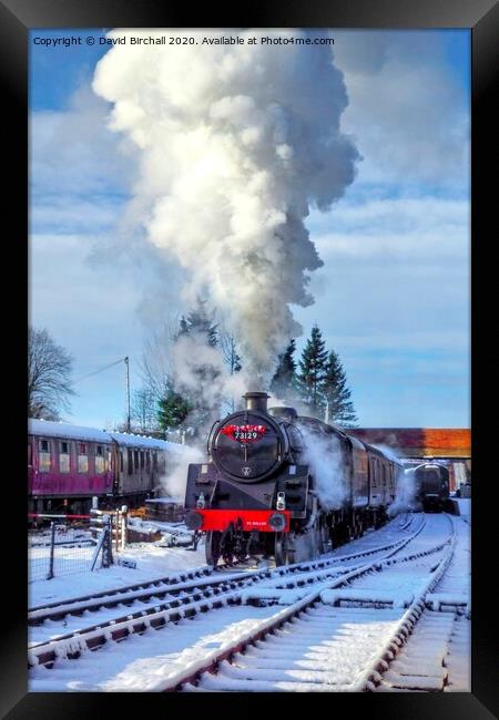 Steam locomotive 73129 in snow. Framed Print by David Birchall
