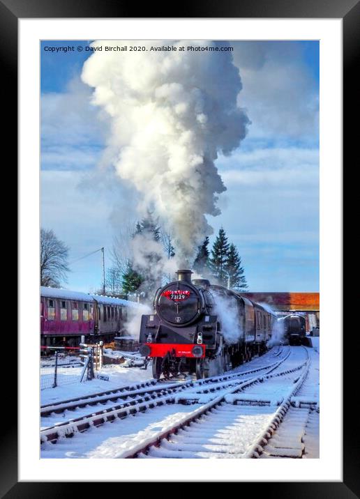 Steam locomotive 73129 in snow. Framed Mounted Print by David Birchall