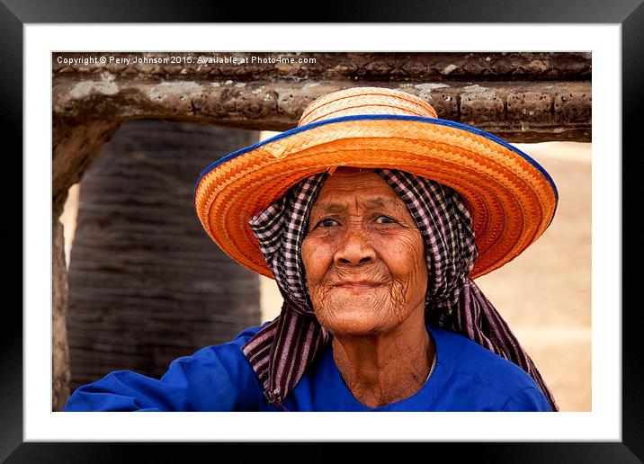 Old lady at Angkor Framed Mounted Print by Perry Johnson