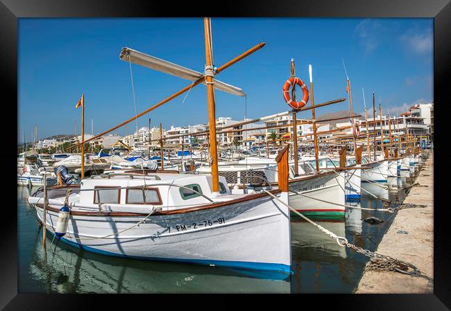 Small boats in Port de Pollensa  Framed Print by Perry Johnson