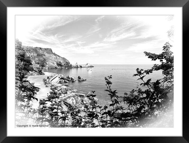 Anstey's Cove through the trees in Torquay in Black and White Framed Mounted Print by Rosie Spooner