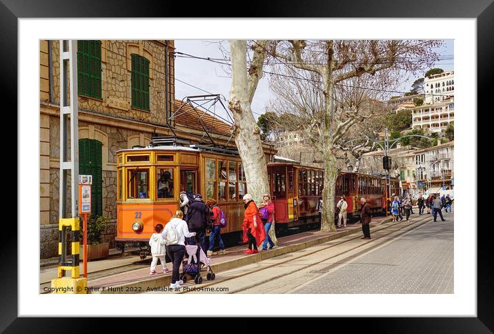 Catching The Tram At Puerto Soller Framed Mounted Print by Peter F Hunt