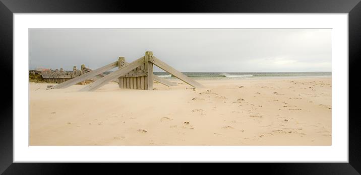 Lossiemouth East beach wave breakers Framed Mounted Print by Lloyd Fudge