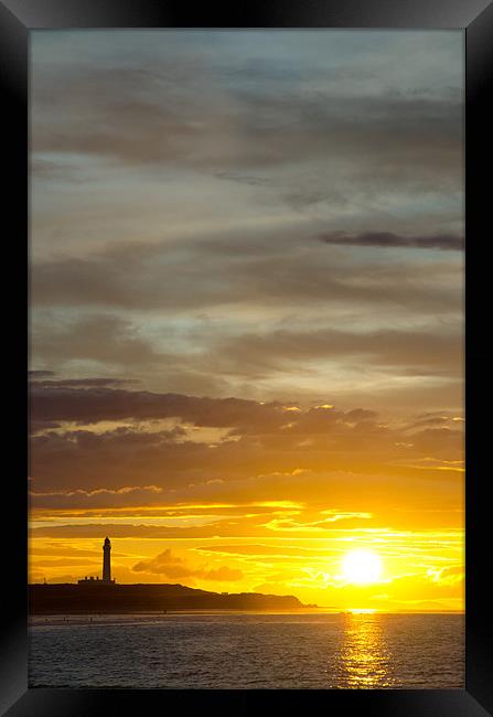 Sunset at lossiemouth lighthouse Framed Print by Lloyd Fudge