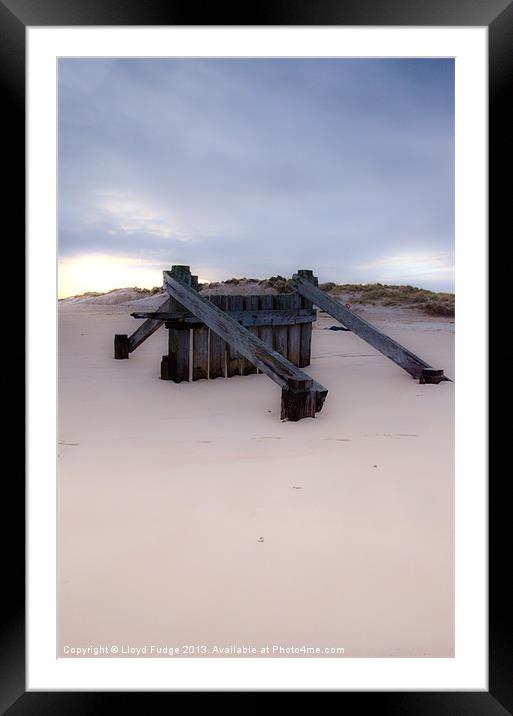 old wave breakers on lossiemouth beach Framed Mounted Print by Lloyd Fudge