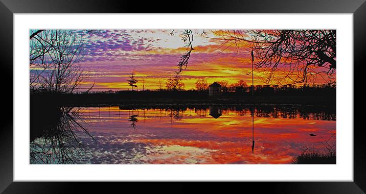Reflection of a sunset Framed Mounted Print by Ian Flear