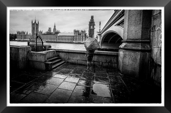 Waiting in the rain Framed Print by Peter Lennon