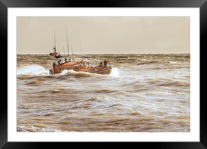 Lifeboat half hidden in the trough Framed Mounted Print by Christine Kerioak