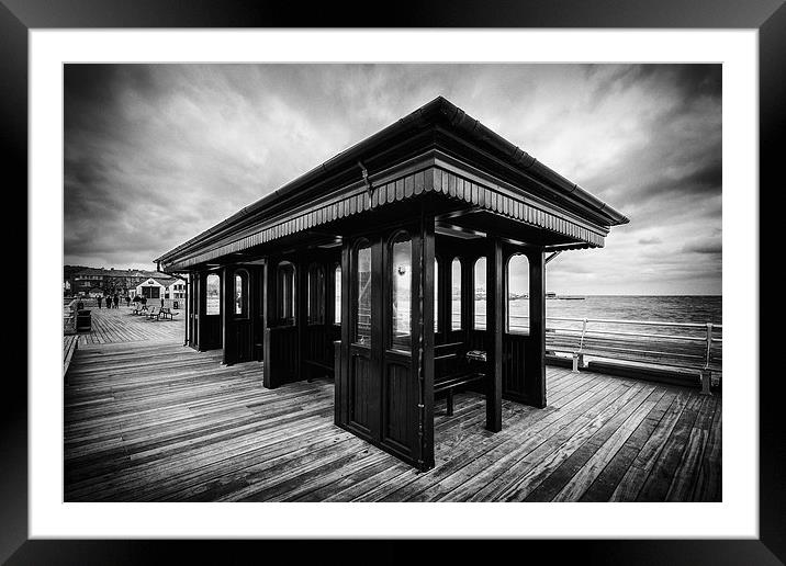 Beaumaris Pier under stormy skies Framed Mounted Print by Andy McGarry