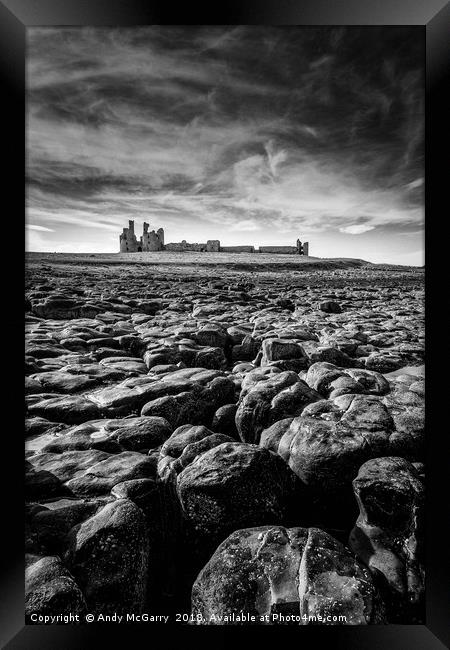Dunstanburgh Castle at low tide Framed Print by Andy McGarry
