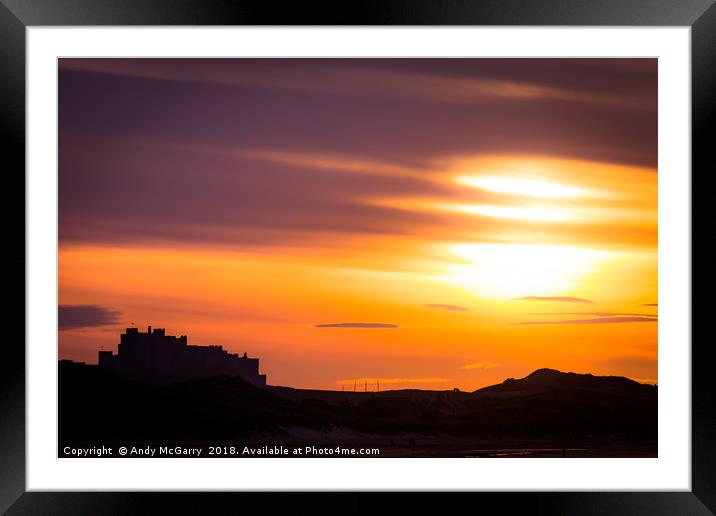 Bamburgh Castle Sunset Framed Mounted Print by Andy McGarry