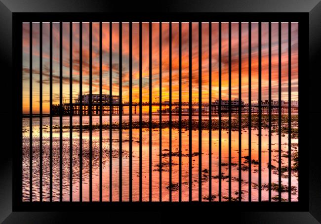 Worthing Pier Sunset Framed Print by Malcolm McHugh