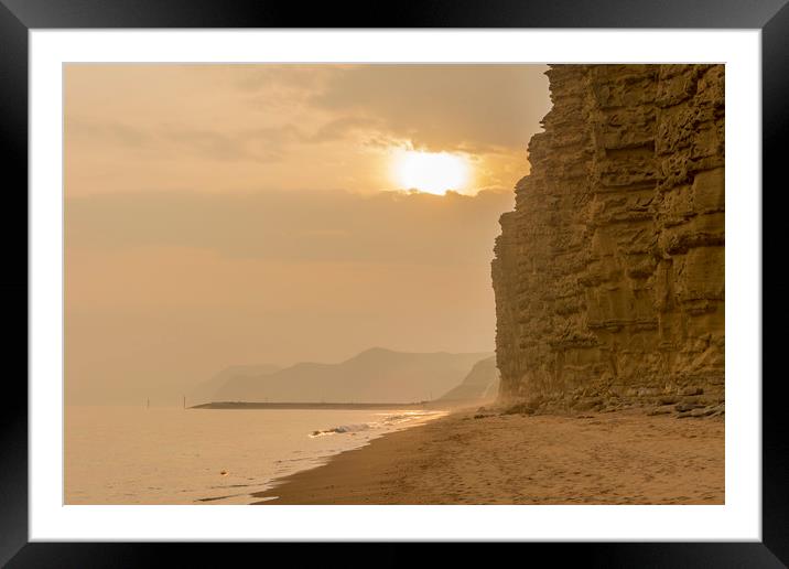 Jurassic Sunset at sultry West Bay Framed Mounted Print by Malcolm McHugh