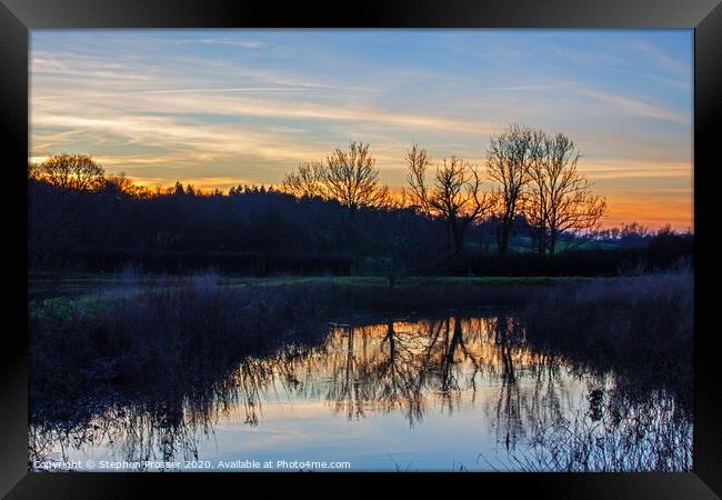 Sunset over the river Framed Print by Stephen Prosser