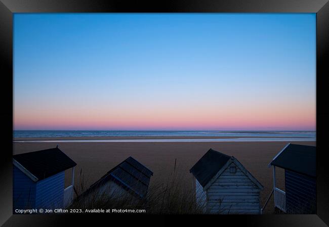 Beach Huts at Daybreak - Wells next the Sea Framed Print by Jon Clifton