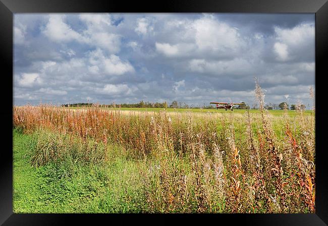 Glider on Yorkshire moors Framed Print by Jean Gill