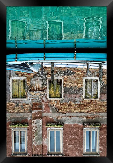 Reflection of Venetian house and boat on a canal Framed Print by Jean Gill