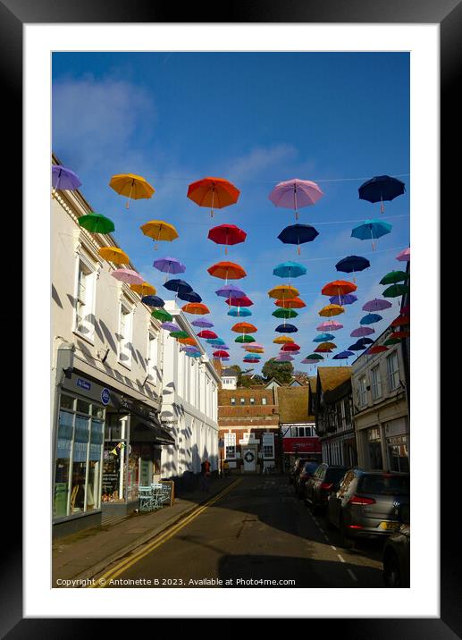 Bank Street with  umbrellas Hythe Kent  Framed Mounted Print by Antoinette B