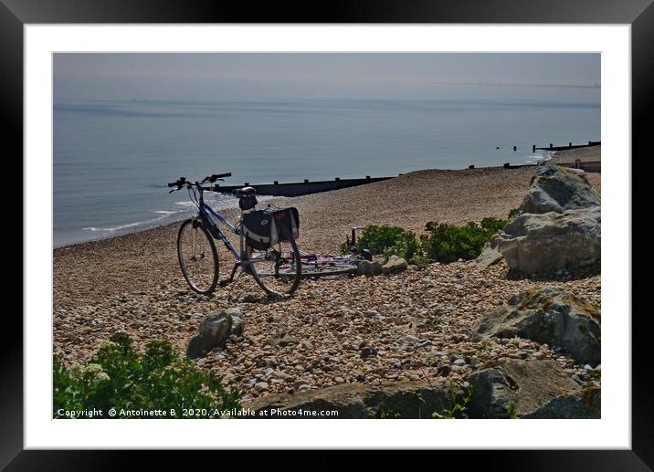 Bicycles on the shingle beach Framed Mounted Print by Antoinette B