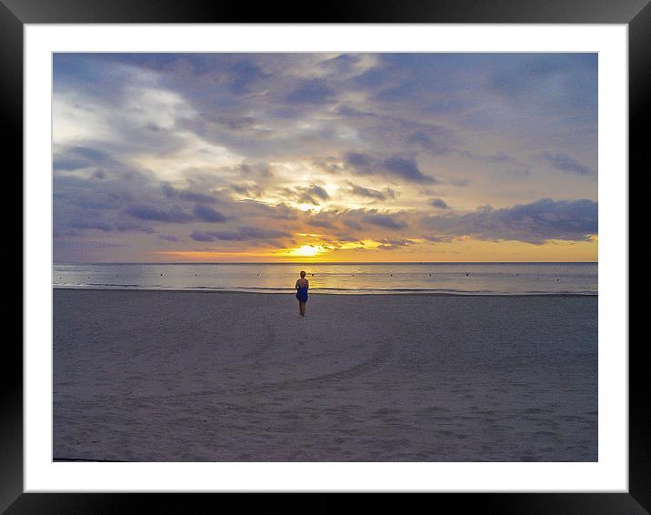 Contemplation at sunset in Borneo Framed Mounted Print by colin chalkley