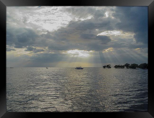 Storm Clouds Over Tonle Sap Lake Framed Print by colin chalkley