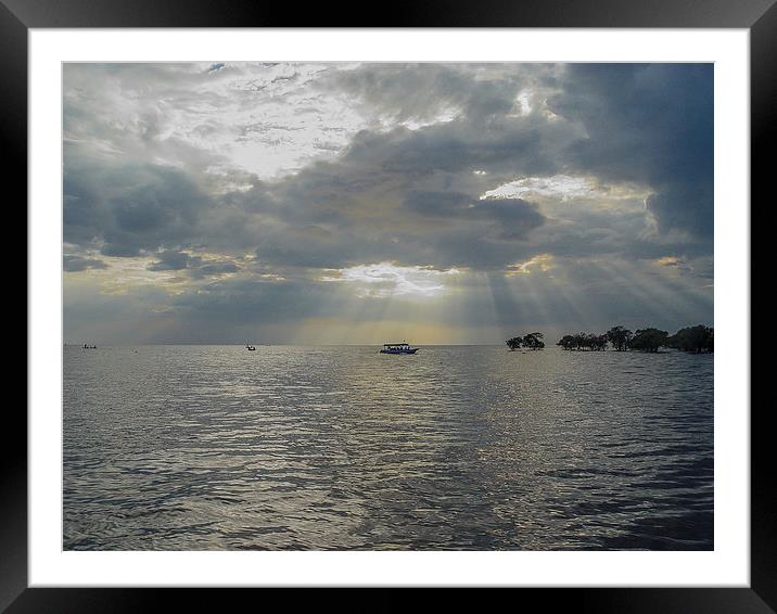 Storm Clouds Over Tonle Sap Lake Framed Mounted Print by colin chalkley
