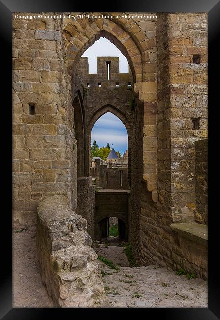  A View Through an Arch at Carcassone Framed Print by colin chalkley