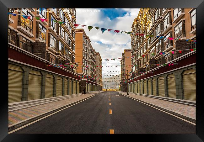  A Pristine Side street in Lhasa Framed Print by colin chalkley
