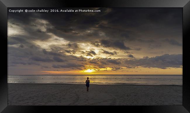 Walking On The Beach At Sunset Framed Print by colin chalkley