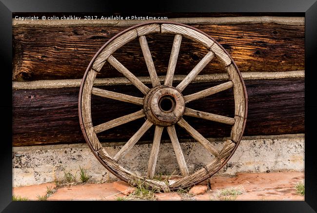 Old Wagon Wheel - Cody, Wyoming Framed Print by colin chalkley