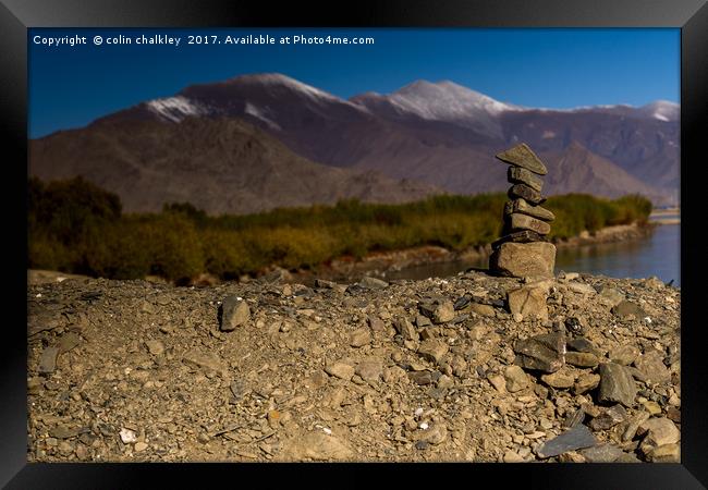 Standing stones in Tibet Framed Print by colin chalkley