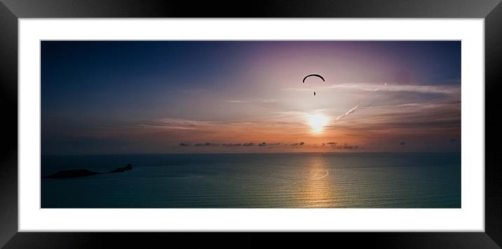 Paragliding over Worms Head Framed Mounted Print by Leighton Collins