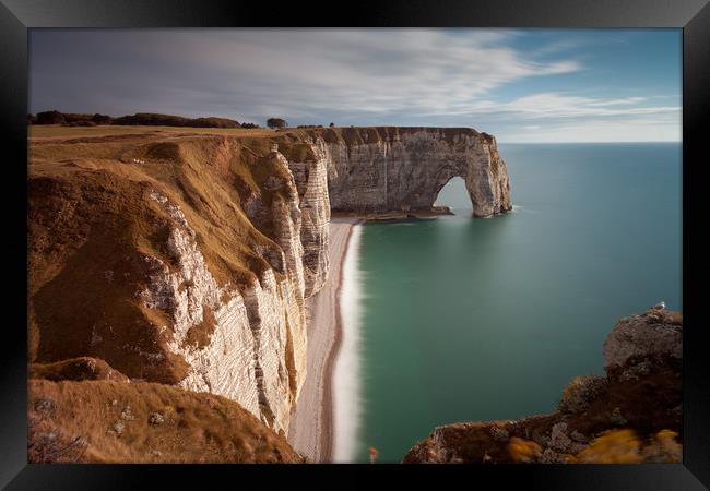 The cliffs and Manneporte arch at Etretat Framed Print by Leighton Collins