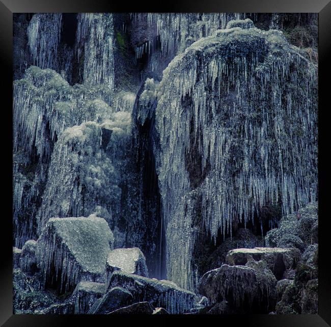 Frozen rocks and icicles Framed Print by Leighton Collins