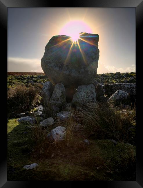 Sun over Arthur's stone Framed Print by Leighton Collins
