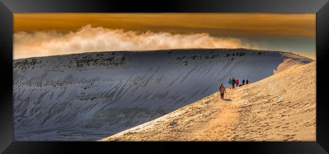 Winter walkers on Penyfan Framed Print by Leighton Collins