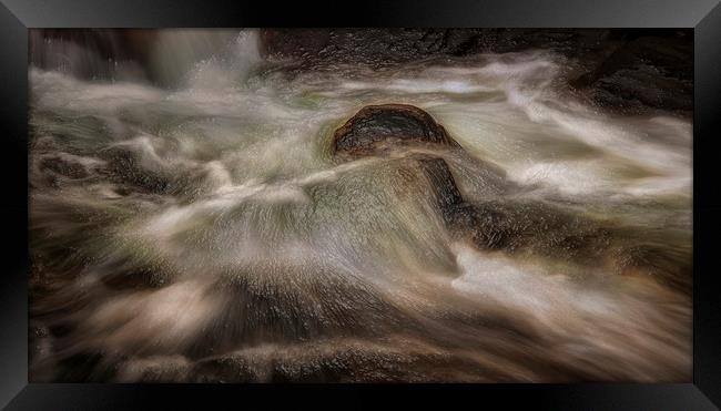 Water and rocks Framed Print by Leighton Collins