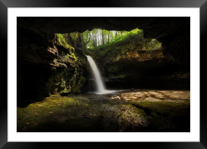 A cave with a waterfall Framed Mounted Print by Leighton Collins
