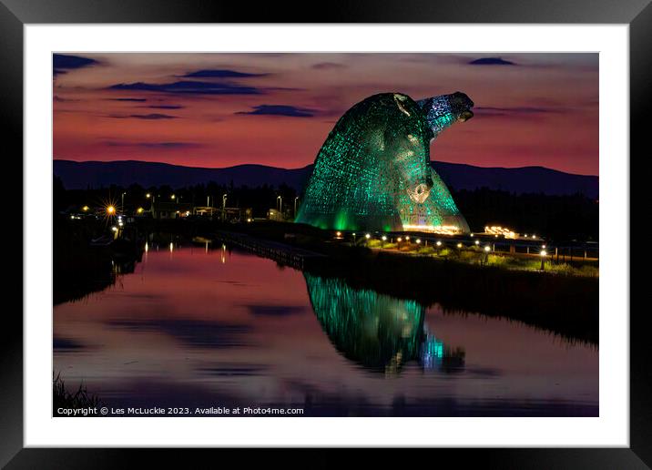 The Kelpies green lights at Night Framed Mounted Print by Les McLuckie