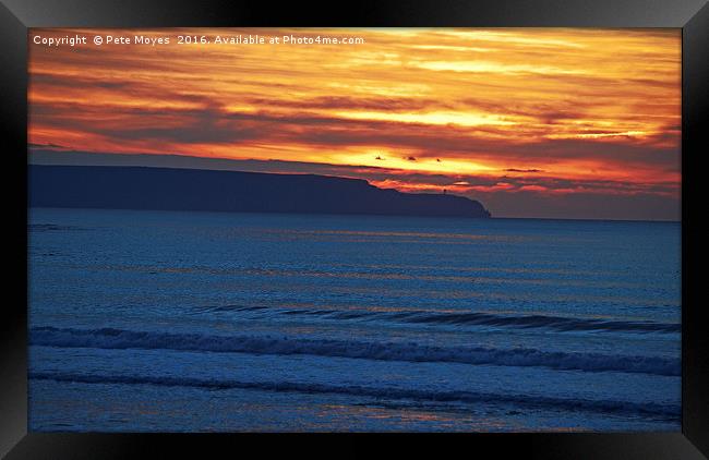 Autumn Sunset over Hartland  Framed Print by Pete Moyes