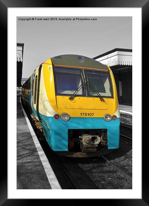 An Arriva train leaving Colwyn bay station. Framed Mounted Print by Frank Irwin