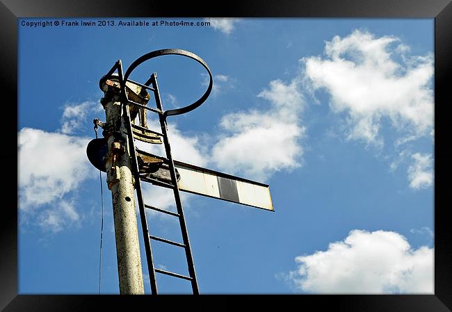 Semaphore type signal set against a blue sky Framed Print by Frank Irwin