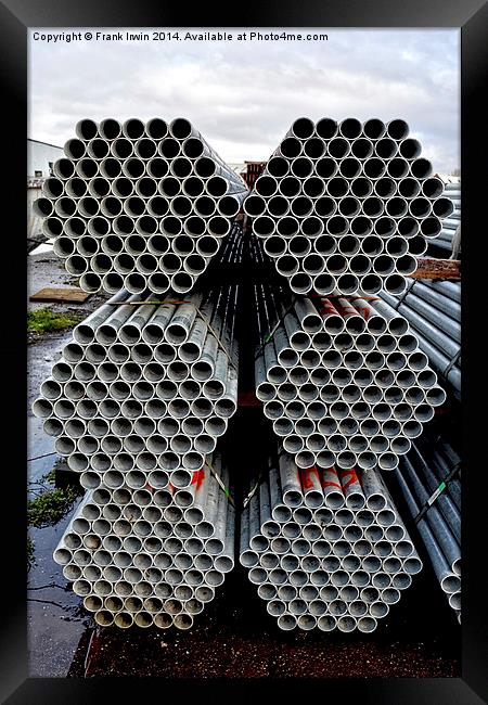Steel tubes stacked and offloaded, ready for deliv Framed Print by Frank Irwin