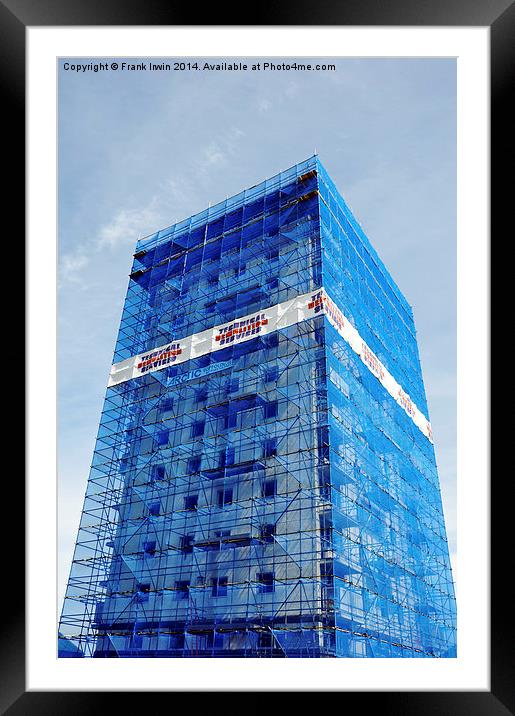 A High-Rise building prepared for demolition Framed Mounted Print by Frank Irwin