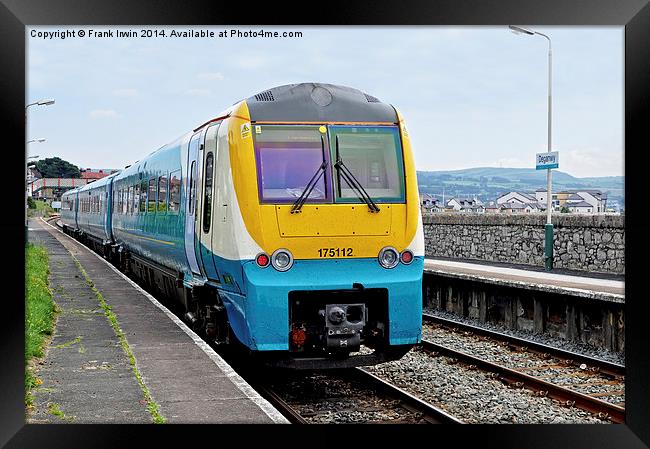 An Arriva train at Deganwy Station Framed Print by Frank Irwin