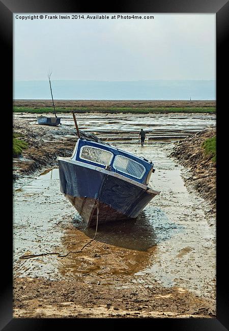 A small motorboat beached in Heswall. Framed Print by Frank Irwin