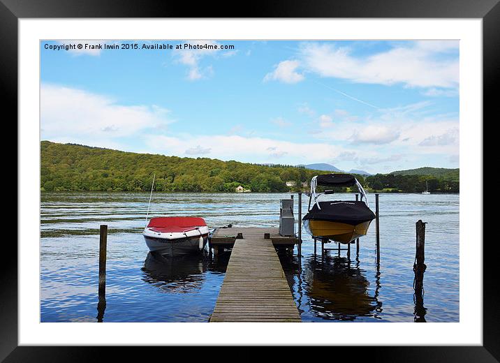 Two boats tied to the mooring posts on a pier Framed Mounted Print by Frank Irwin