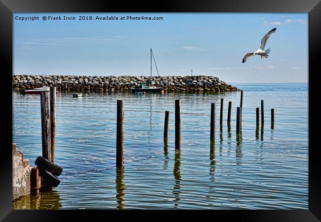 The submerged jetty at Rhos-on-Sea. North Wales. Framed Print by Frank Irwin