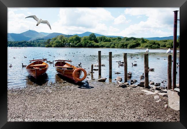 Rowing boats on Derwent water Framed Print by Frank Irwin